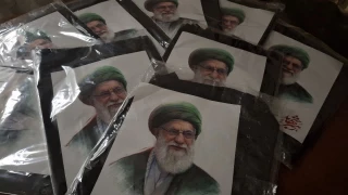 دوخت و پخش پارچه مشکی به همراه عکس رهبر شهیدمون
